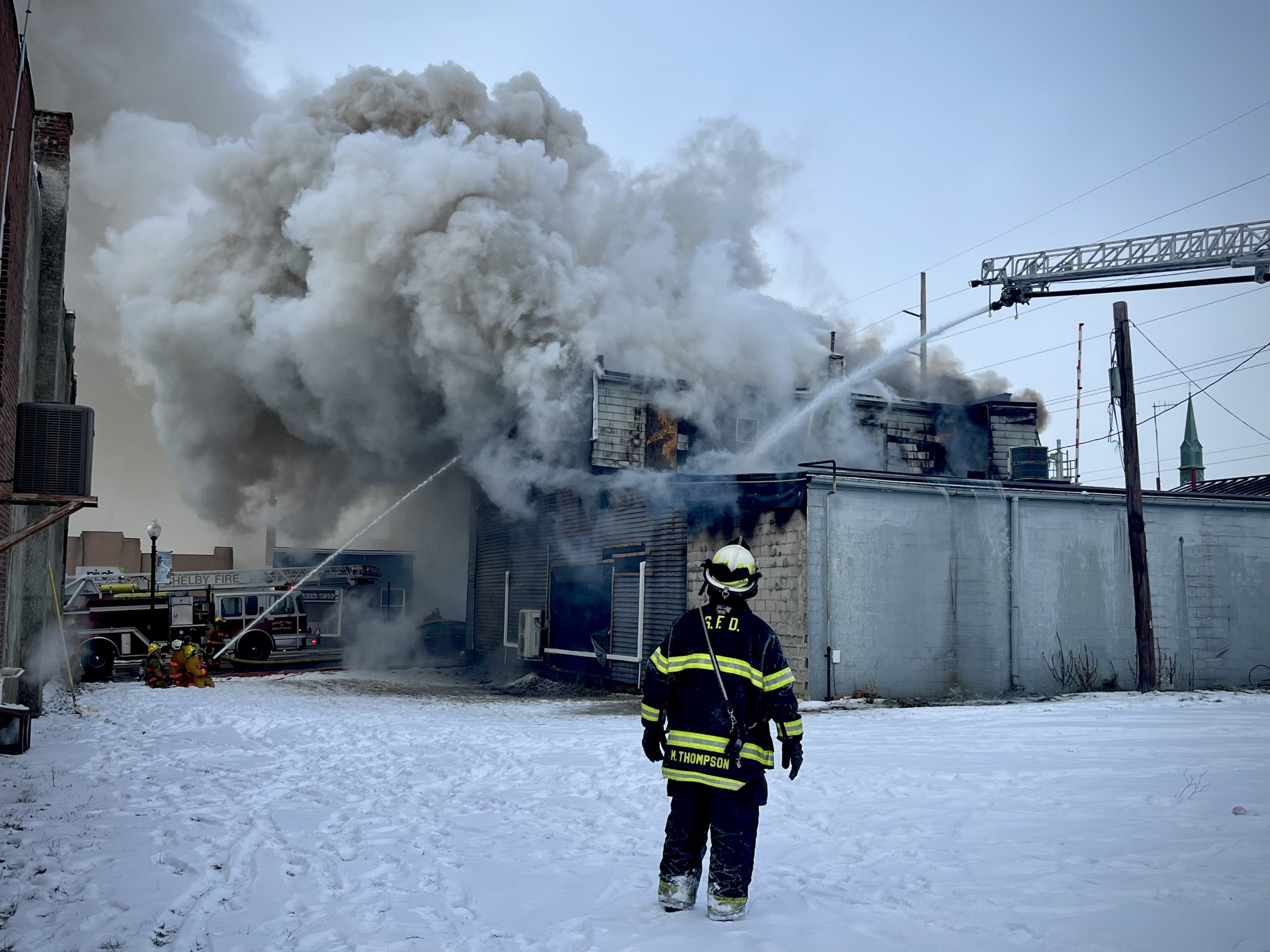 Local firefighters battle downtown Shelby fire into Wednesday evening