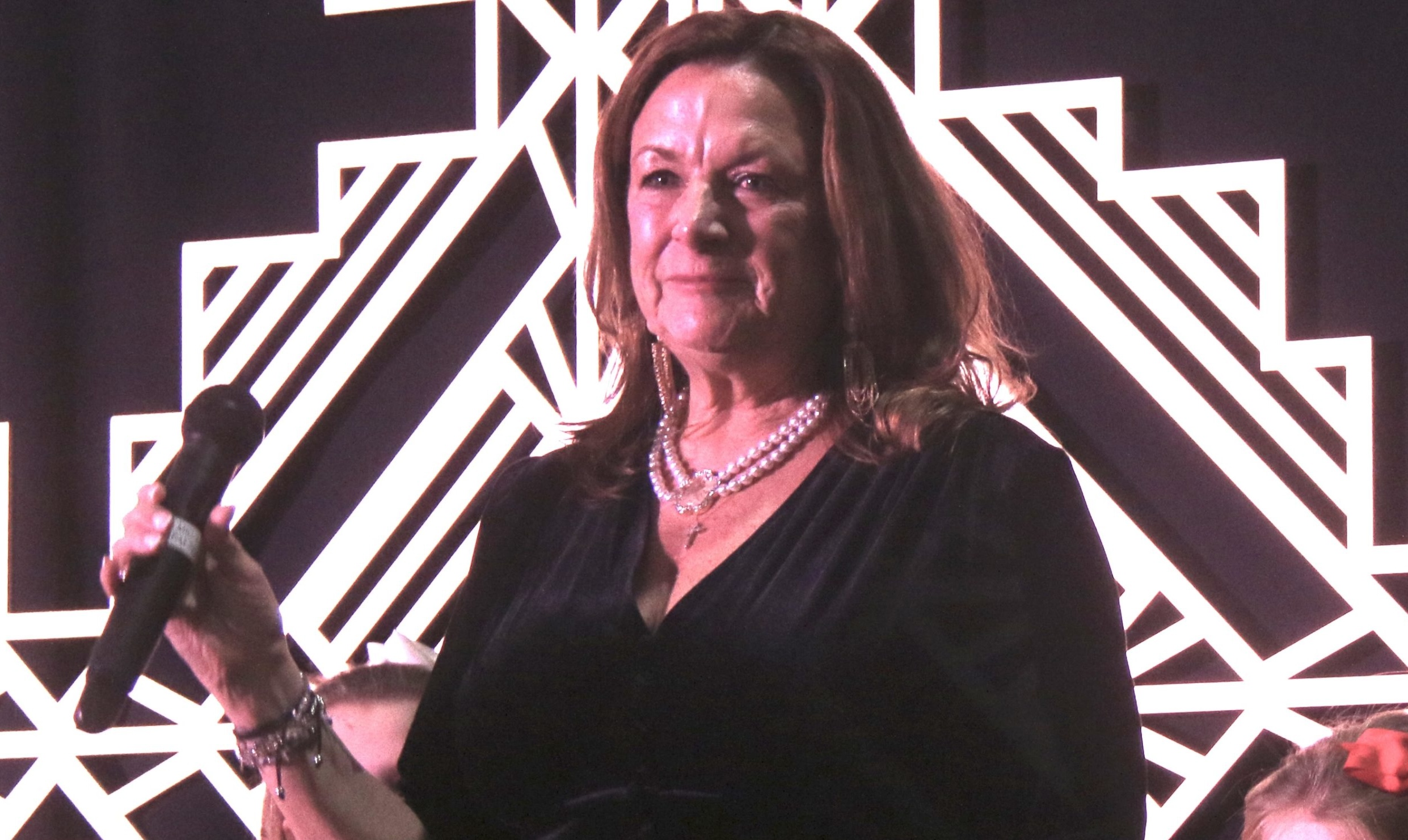 Beth DeLaney honored with annual ATHENA award during chamber event