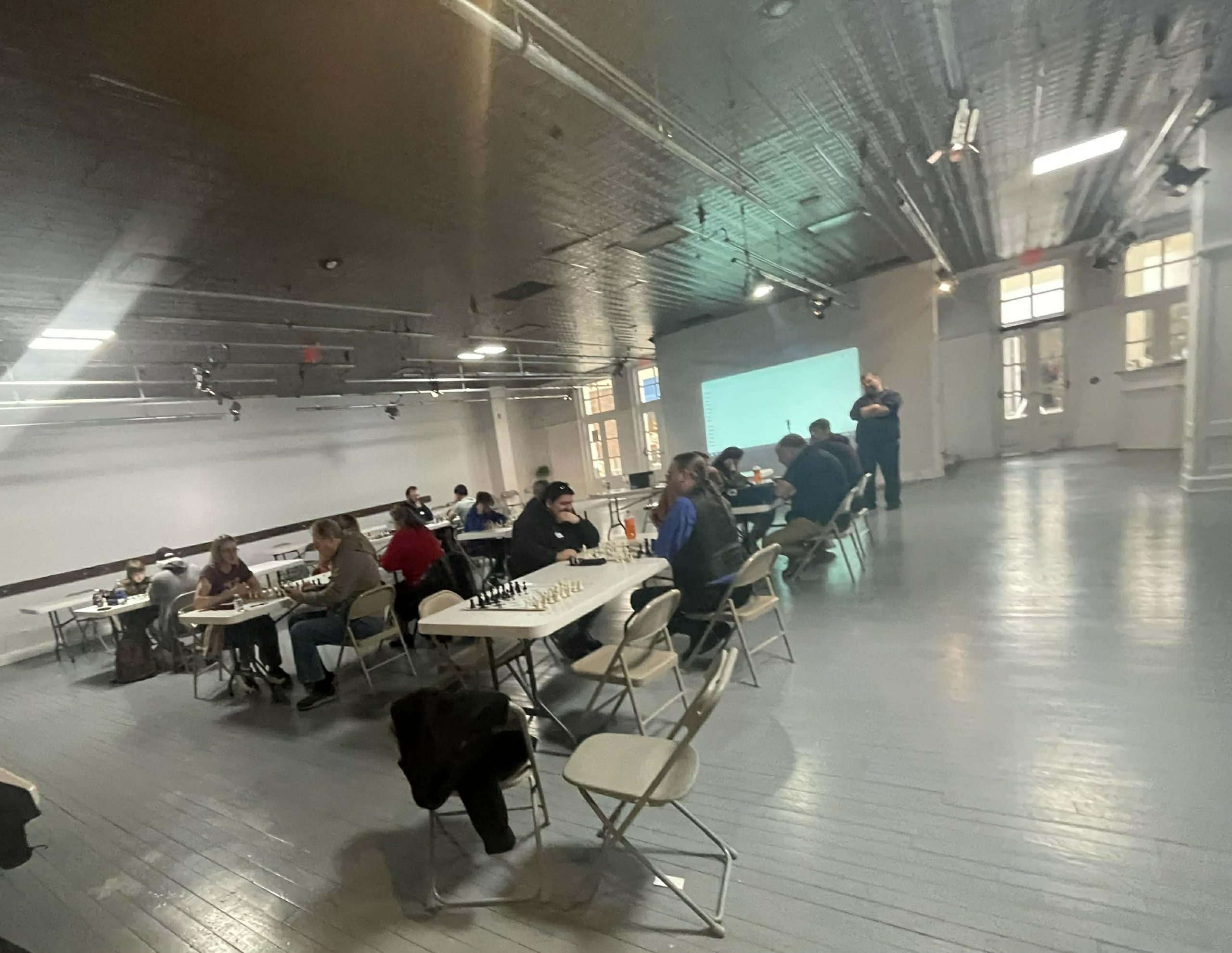 Chess Bus celebrates book release and draws 30-plus players to Ontario Center for festival