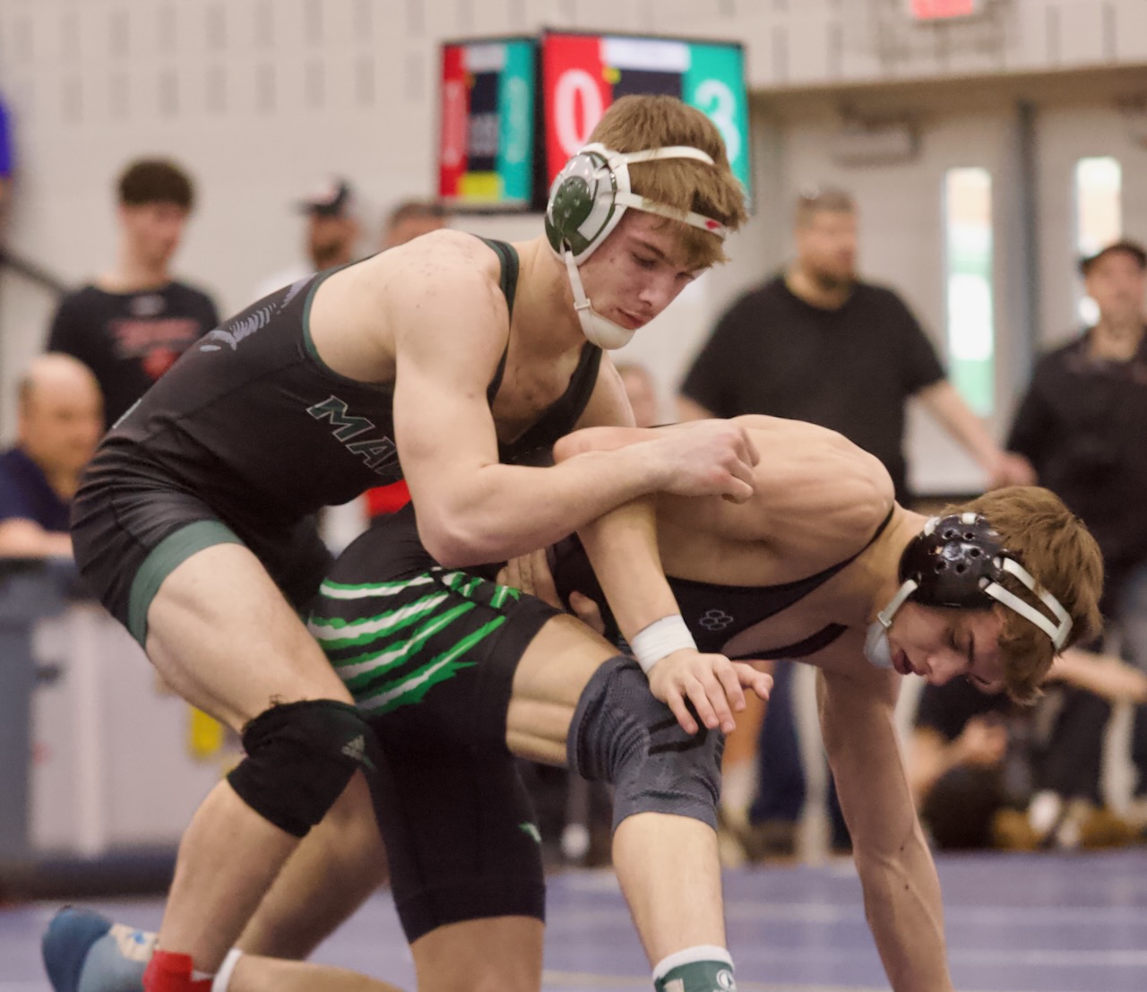 Madison's Proctor storms to district wrestling title
