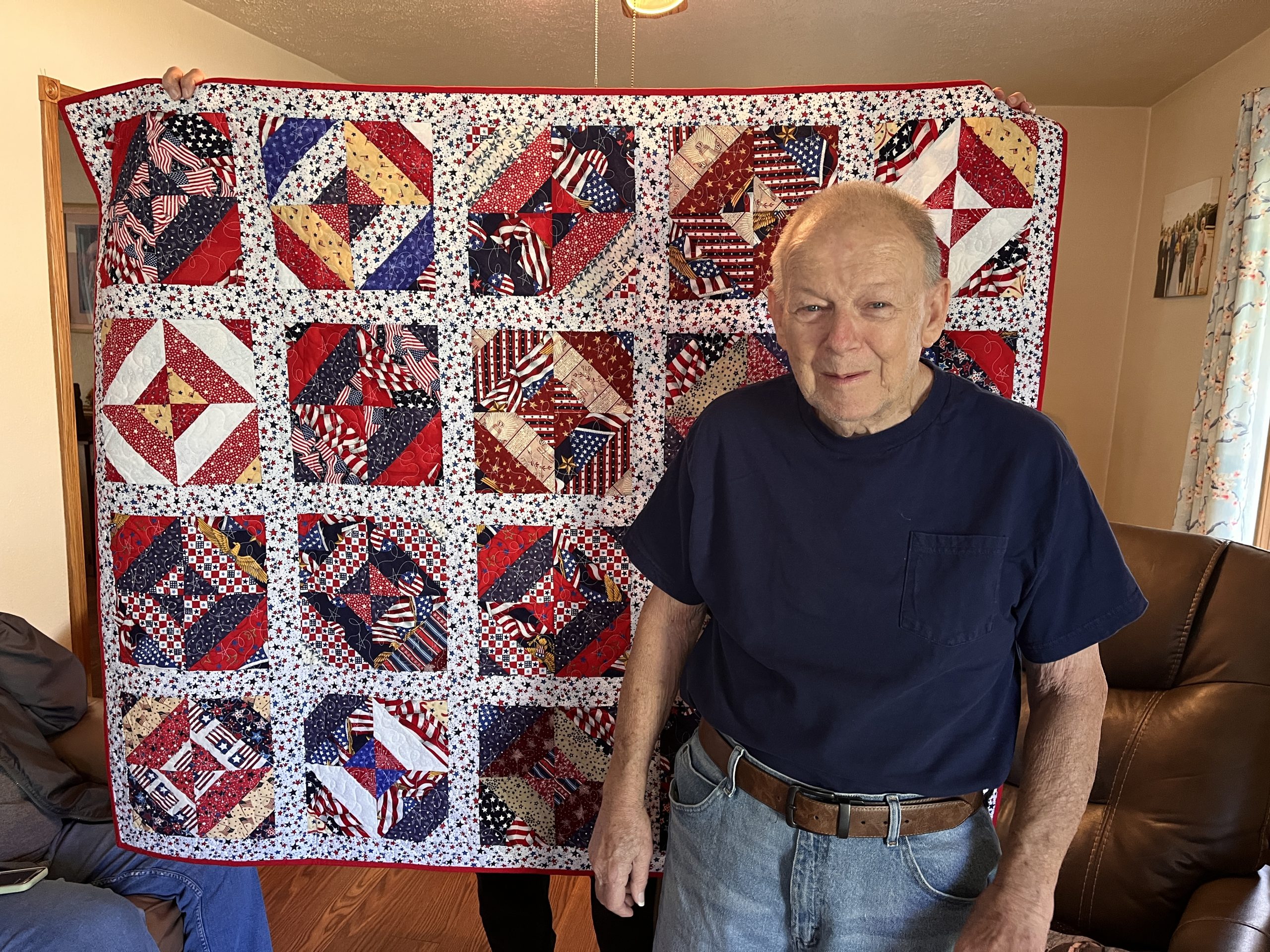 Stitched with gratitude: 10-Year Navy veteran presented with Quilt of Valor in Lucas